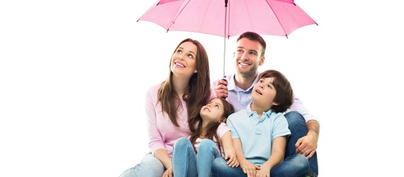 A Family Posing Below the Umbrella Image
